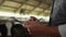 Closeup hands writing clipboard at farm facility. Livestock manager man work