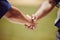 Closeup, handshake and baseball for game, match or contest with respect in sport on field. Shaking hands, man and