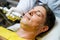 Closeup handsome man having therapy to stimulate facial skin and facial ultrasonic skincare treatment by professional