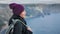 Closeup happy hiker woman backpack contemplating amazing nature sea landscape from mountain peak