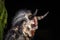 Closeup of head of horned devil in traditional krampuslauf with wooden masks in Retz, Austria