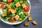 Closeup of healthy Caesar salad with croutons