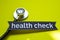 Closeup healthy check with stethoscope concept inspiration on yellow background