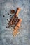 Closeup on healthy and tasty pine nuts in small wooden different scoop with cedar bump