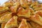 Closeup Heap of Baklava Pastries on a Large Tray with Selective Focus