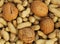 Closeup of Heap of Peanuts and Walnuts abstract food product background