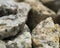 Closeup of a heap of rocks. Selected focus.
