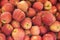 Closeup heap sweet fresh ripe red apples. Fruit backround. Healthy food.