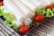 Closeup of Heart of palm (palmito) with cherry tomato