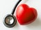 Closeup of heart and a stethoscope cardiovascular checkup concept