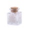 Closeup Himalayan salt in wooden spoon and bottle on white background