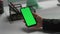 Closeup holding mockup smartphone in hand. Office manager checking social media