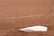 Closeup of home plate at baseball diamond