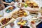 Closeup of homemade grilled food on wooden table summer party