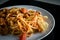 Closeup homemade spagetti with italian red sauce on plate