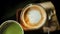 Closeup of Hot Coffee Latte and Matcha Green Tea in Cup on Table. Top View. Cafe or Restaurant