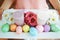 Closeup on housewife holding easter decorated plate