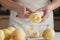 Closeup on housewife peeling pear