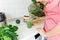 Closeup housewife pours ready green smoothie. Healthy food.Happy woman on detox diet, pouring green cocktail from mixer