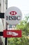 Closeup of HSBC sign on Bank agency building in the street