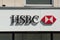 Closeup of HSBC sign on Bank agency building in the street