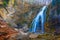 Closeup huge waterfall on mountain river