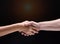 Closeup human hand touch together.They are shaking hand to be sign for trust and teamwork