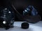 Closeup of ice hockey equipment against a dark background. Ice hockey helmet, stick, puck and gloves