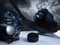 Closeup of ice hockey equipment against a dark background. Ice hockey helmet, stick, puck and gloves