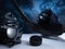 Closeup of ice hockey equipment against a dark background. Ice hockey helmet, stick, puck and gloves