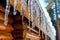 closeup of icicles hanging from a cabins roof edge