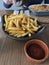 Closeup image of a bowl of French fries