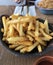 Closeup image of a bowl of French fries