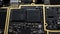 Closeup image of a computer motherboard with micro converts
