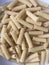 Closeup image of dry tortiglioni pasta