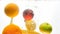 Closeup image of lots of tasty fresh juicy fruits falling in water and splashing