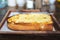 Closeup image of a piece of sliced bread toast with cheese