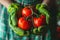 Closeup image of woman s hands in gardening gloves planting tomato