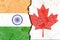 Closeup of India versus Canada  vertical  National flags in the background
