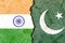 Closeup of  India versus Pakistan  vertical  National flags in the background