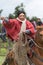 Closeup of indigenous quechua chagra on horseback