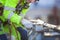 Closeup of industrial climber working on roof