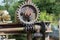 Closeup of an industrial mechanic gear of an abandoned and rusty machine covered in spider web