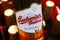 Closeup of isolated bottle czech Budweiser Budvar lager beer. Blurred container with bottles background