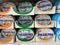 Closeup of isolated boxes Kraft Philadelphia soft cheese in cooling shelf