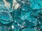 Closeup of isolated turquoise rough glas shards