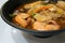 Closeup Jjamppong or Jjampong Korean seafood noodle soup