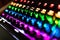 Closeup of keyboard illumination Multicolour Rainbow colors for play Games Online. backlit keyboard Concept