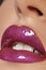 Closeup kiss lip makeup. Beautiful plump full lips on face. Sweet pink lipstick, magenta color. Valentine`s day style