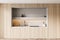 Closeup of kitchen cabinet with light grey stone niche